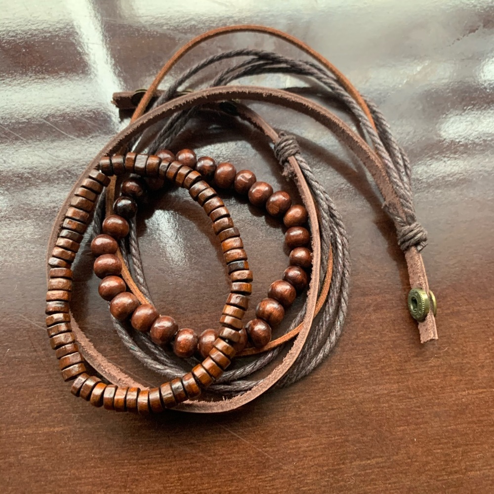 3 bracelets, 2 beaded and 1 leather
